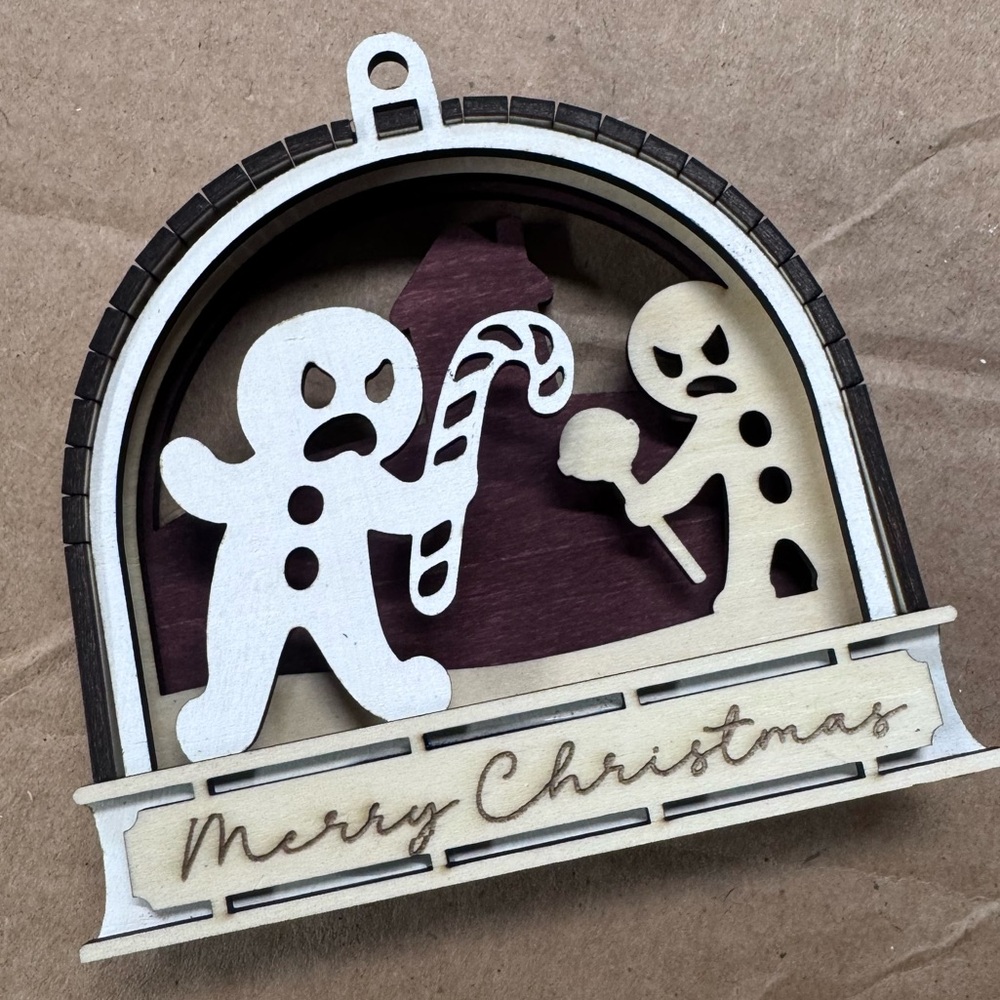 3/$20 Layered Wooden Gingerbread Ornament – Funny Christmas Cookie Fight Scene - Picture 2 of 4